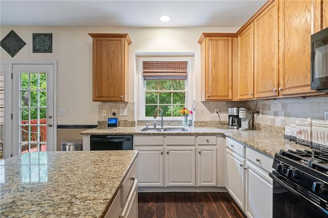 1360 Woodvine Way, Alpharetta, GA 30005 - kitchen with a sink, black appliances, dark wood-type flooring, recessed lighting, and light stone countertops