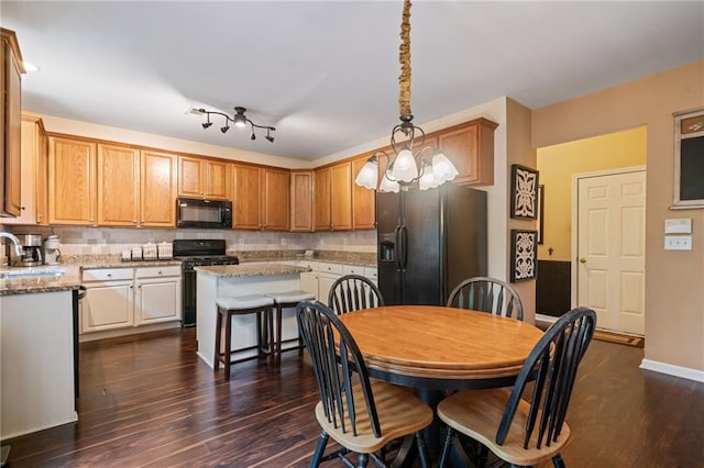 1360 Woodvine Way, Alpharetta, GA 30005 - kitchen with black appliances, a sink, dark wood-style floors, a center island, and tasteful backsplash