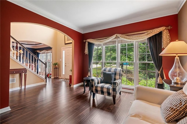 1360 Woodvine Way, Alpharetta, GA 30005 - living area featuring baseboards, arched walkways, plenty of natural light, crown molding, and stairs