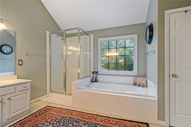 1360 Woodvine Way, Alpharetta, GA 30005 - bathroom featuring a stall shower, a bath, vanity, and vaulted ceiling