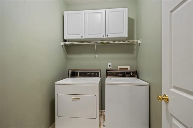 1360 Woodvine Way, Alpharetta, GA 30005 - laundry room featuring cabinet space and washing machine and dryer