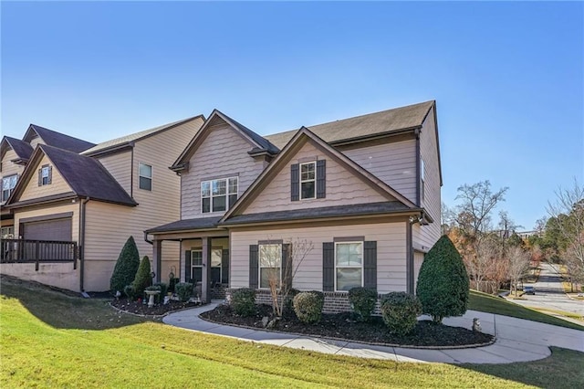 craftsman-style home with a front lawn