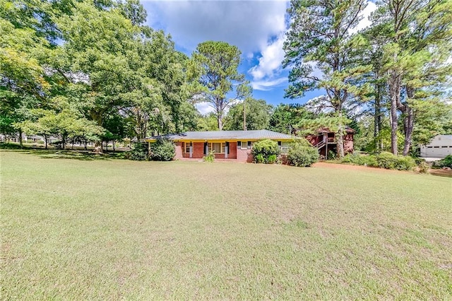 exterior space featuring a front lawn