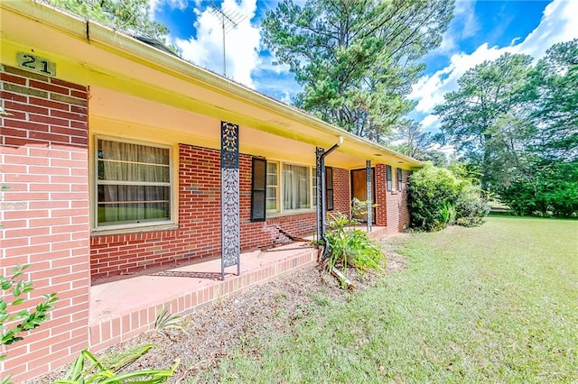 exterior space featuring a lawn