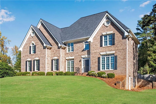 view of front of home with a front yard