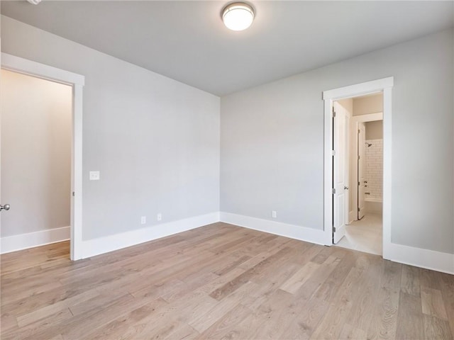 unfurnished room featuring light hardwood / wood-style flooring