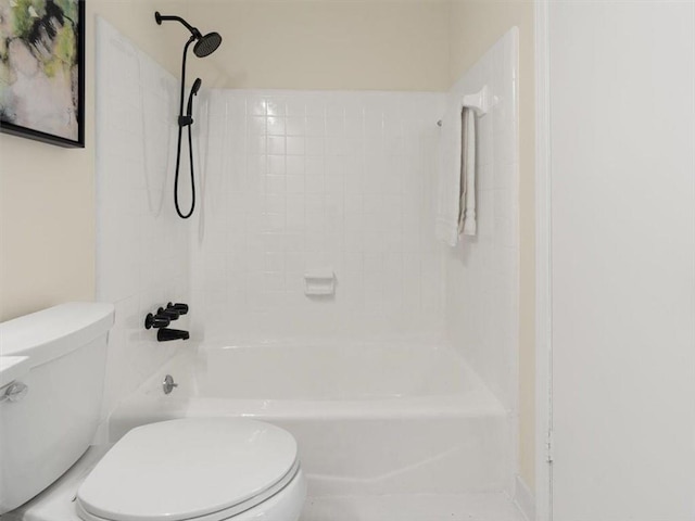 bathroom with toilet and shower / bathtub combination