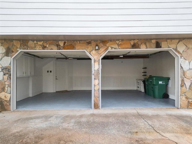 garage featuring driveway