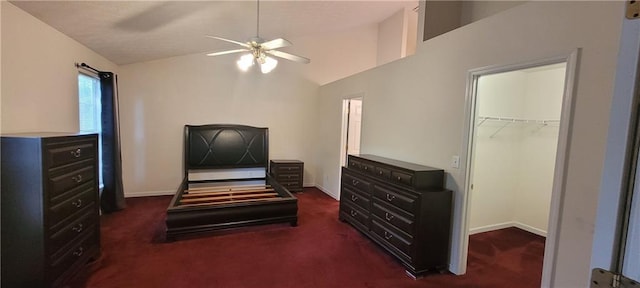 2703 Hillvale Cove Dr, Lithonia, GA 30058 - bedroom featuring carpet flooring, vaulted ceiling, a spacious closet, and baseboards