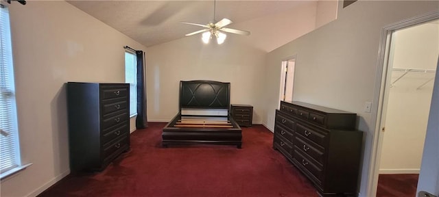2703 Hillvale Cove Dr, Lithonia, GA 30058 - bedroom featuring multiple windows, lofted ceiling, carpet floors, and baseboards
