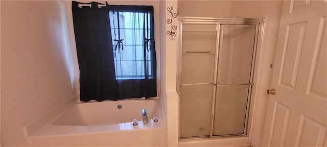 2703 Hillvale Cove Dr, Lithonia, GA 30058 - bathroom with a shower stall and a bath
