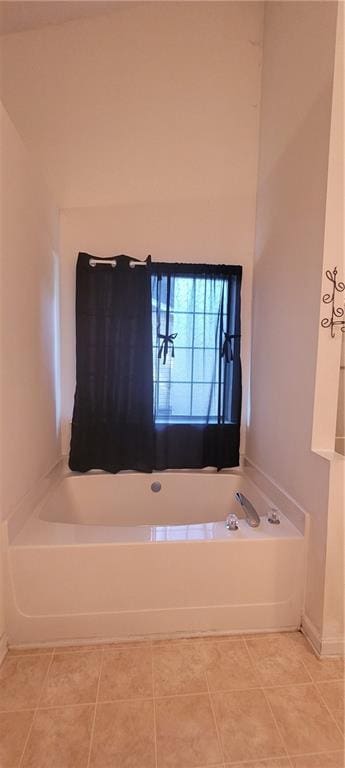 2703 Hillvale Cove Dr, Lithonia, GA 30058 - full bathroom with a bath and baseboards