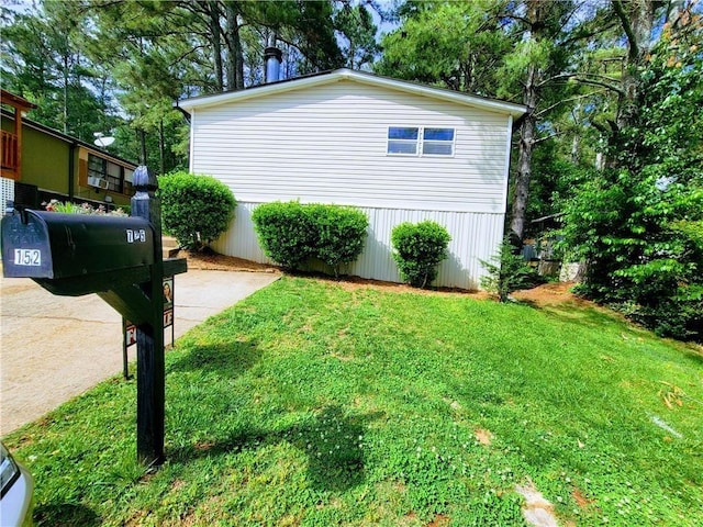 3735 Fir Dr, Buford, GA 30518 - view of property exterior with a lawn