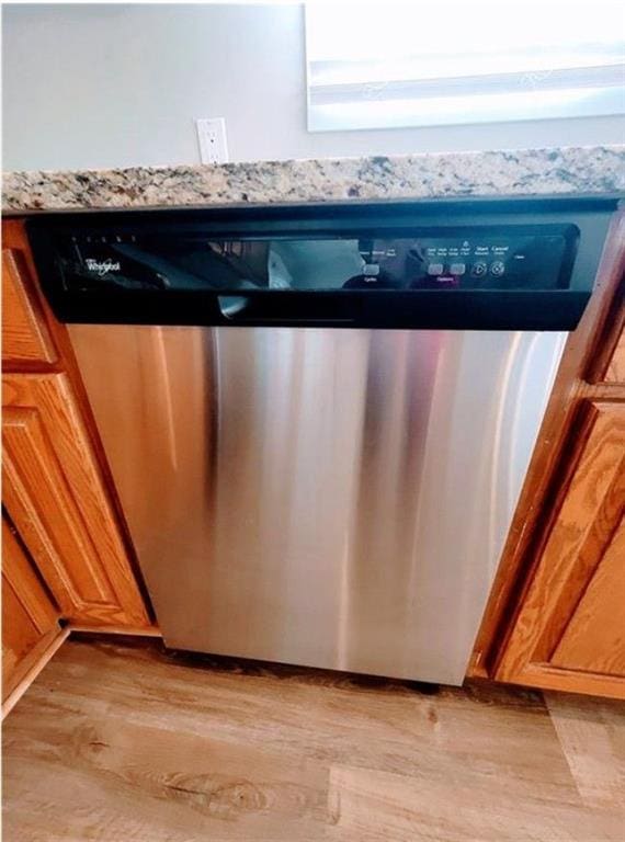 3735 Fir Dr, Buford, GA 30518 - interior details featuring light wood-type flooring and dishwasher