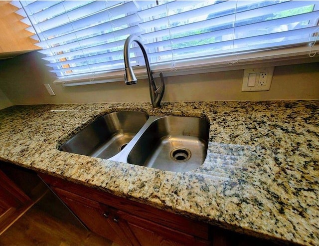 3735 Fir Dr, Buford, GA 30518 - room details featuring a sink and light stone counters