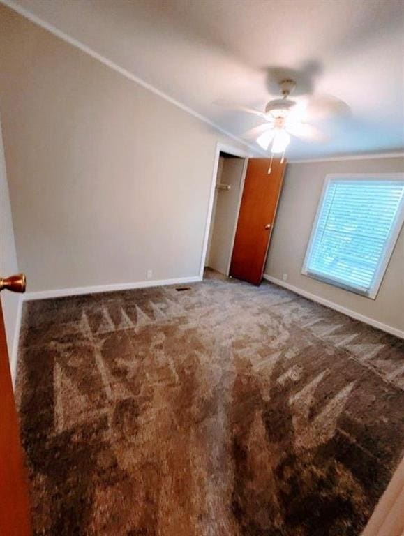 3735 Fir Dr, Buford, GA 30518 - unfurnished bedroom with baseboards, ornamental molding, and carpet