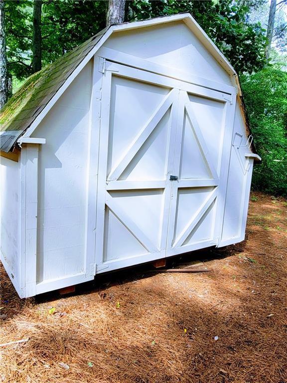 3735 Fir Dr, Buford, GA 30518 - view of outdoor structure with an outbuilding