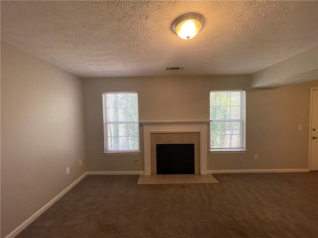 1374 To Lani Farm Rd, Stone Mountain, GA 30083 - unfurnished living room featuring a fireplace with flush hearth, carpet floors, and baseboards