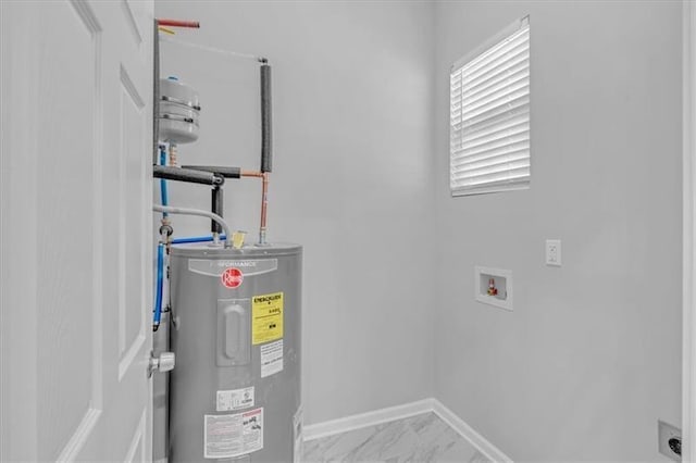 utility room with electric water heater