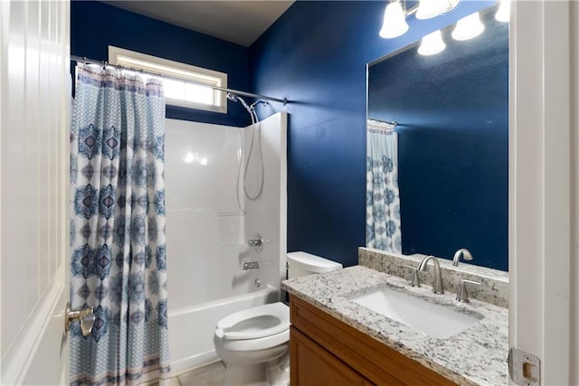 bathroom with shower / bathtub combination with curtain, vanity, and toilet