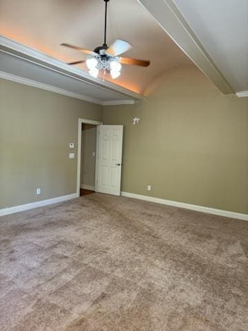 interior space featuring ceiling fan, carpet floors, vaulted ceiling, and ornamental molding