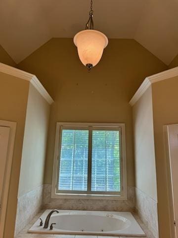 bathroom with vaulted ceiling and tiled tub