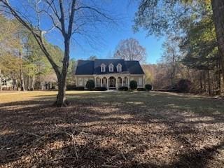 view of new england style home