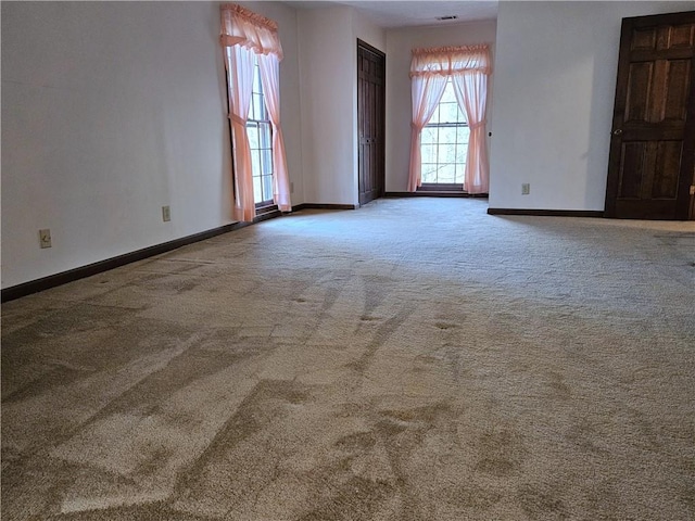 spare room with carpet