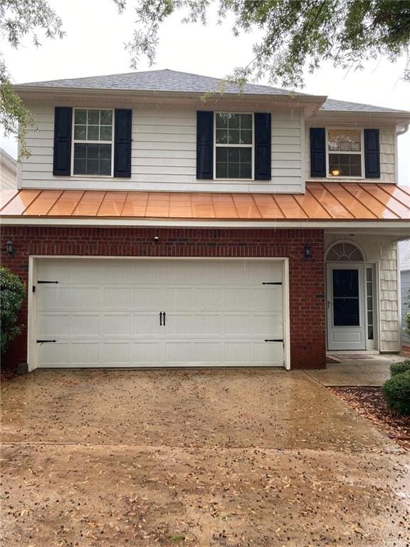 view of property with a garage