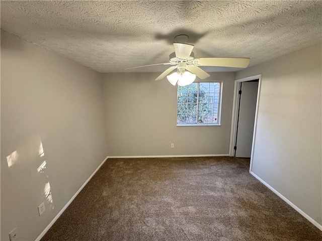 empty room with carpet, a textured ceiling, and ceiling fan