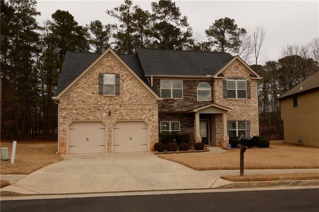 view of front of home with a garage