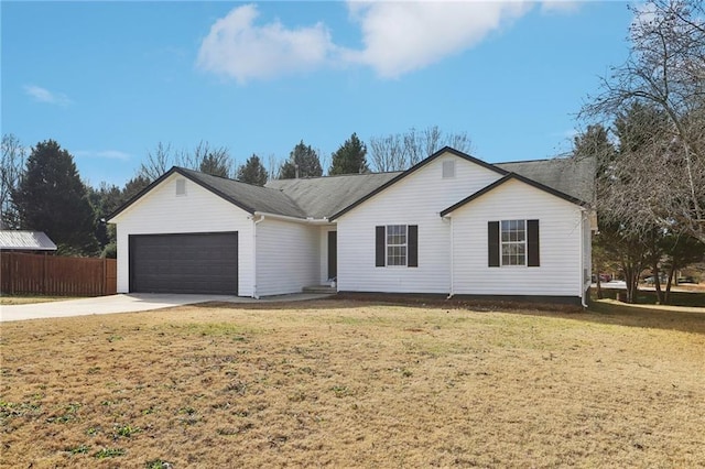 single story home featuring a garage and a front lawn