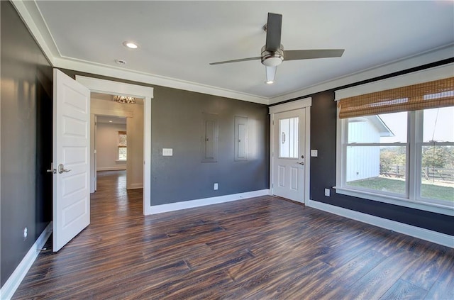 interior space with ceiling fan, crown molding, and dark wood-type flooring