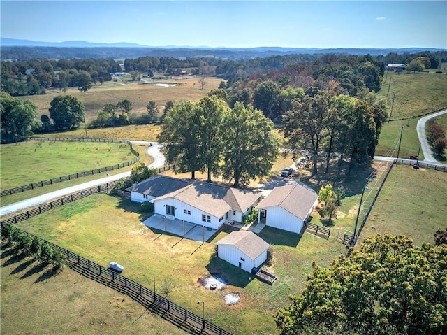 birds eye view of property featuring a rural view