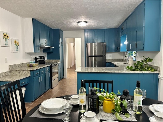 kitchen with stainless steel appliances and blue cabinets