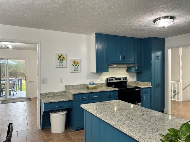 kitchen with blue cabinetry, dark tile patterned flooring, light stone countertops, a textured ceiling, and black / electric stove