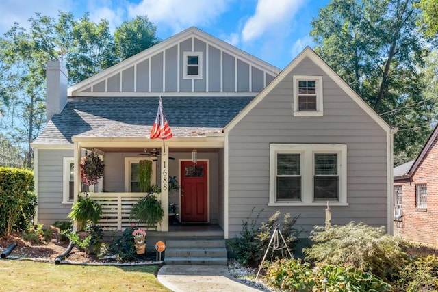 1688 Richland Rd SW, Atlanta, GA 30311 - view of front of property featuring a porch, roof with shingles, board and batten siding, and a chimney