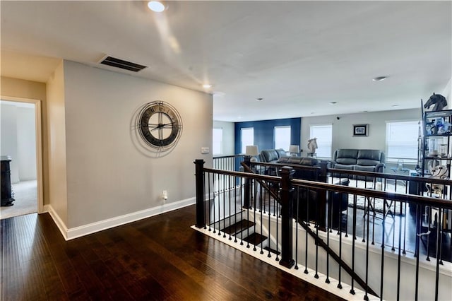 133 Canal St, Hampton, GA 30228 - hallway featuring an upstairs landing, hardwood / wood-style floors, baseboards, and recessed lighting