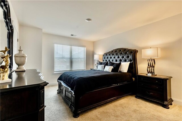 133 Canal St, Hampton, GA 30228 - bedroom with light carpet and baseboards