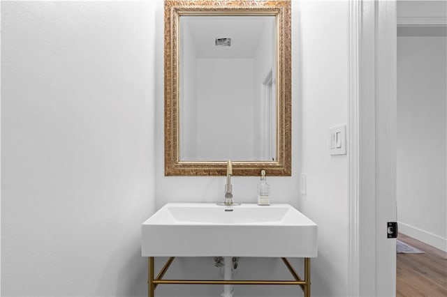 108 Vinings Forest Cir SE, Smyrna, GA 30080 - bathroom with a sink and wood finished floors
