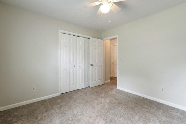 4841 Partee Trl, Social Circle, GA 30025 - unfurnished bedroom with carpet flooring, baseboards, a closet, and ceiling fan