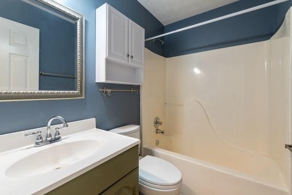 4841 Partee Trl, Social Circle, GA 30025 - bathroom featuring toilet, shower / bath combination, and vanity