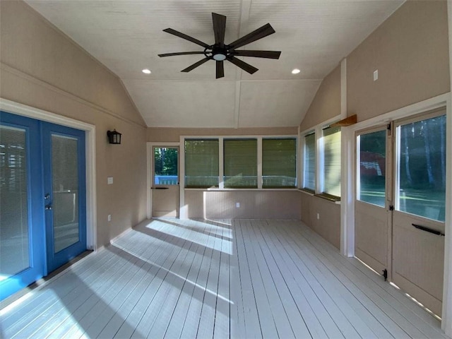 4841 Partee Trl, Social Circle, GA 30025 - unfurnished sunroom with wood-type flooring, vaulted ceiling, and recessed lighting