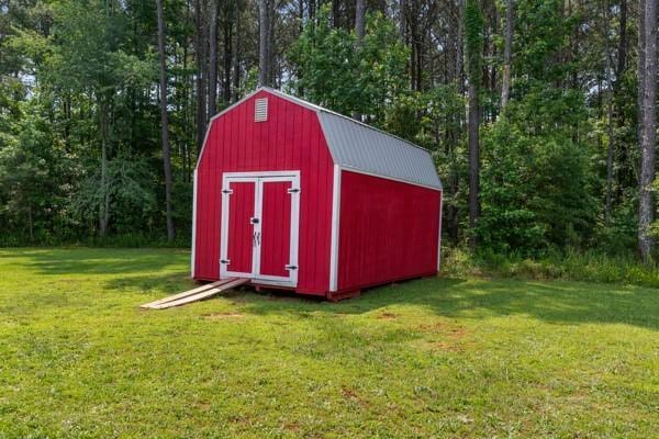 4841 Partee Trl, Social Circle, GA 30025 - view of shed featuring a view of trees