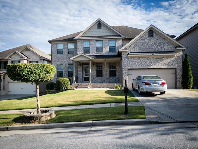 craftsman inspired home with a garage and a front yard