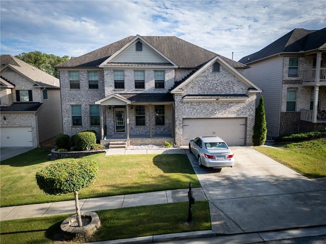 view of front facade featuring a garage and a front lawn