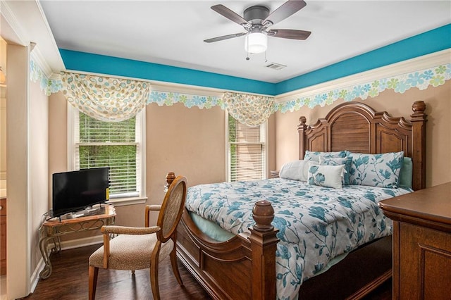 bedroom with visible vents, ceiling fan, baseboards, and dark wood-style floors