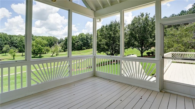 127 Grandmar Chase, Canton, GA 30115 - unfurnished sunroom featuring view of scattered trees and lofted ceiling