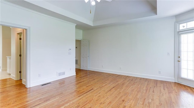 127 Grandmar Chase, Canton, GA 30115 - spare room featuring light wood-style floors, ceiling fan, and a raised ceiling