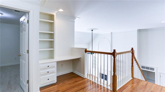 127 Grandmar Chase, Canton, GA 30115 - hallway with an upstairs landing, wood finished floors, built in shelves, and an office area